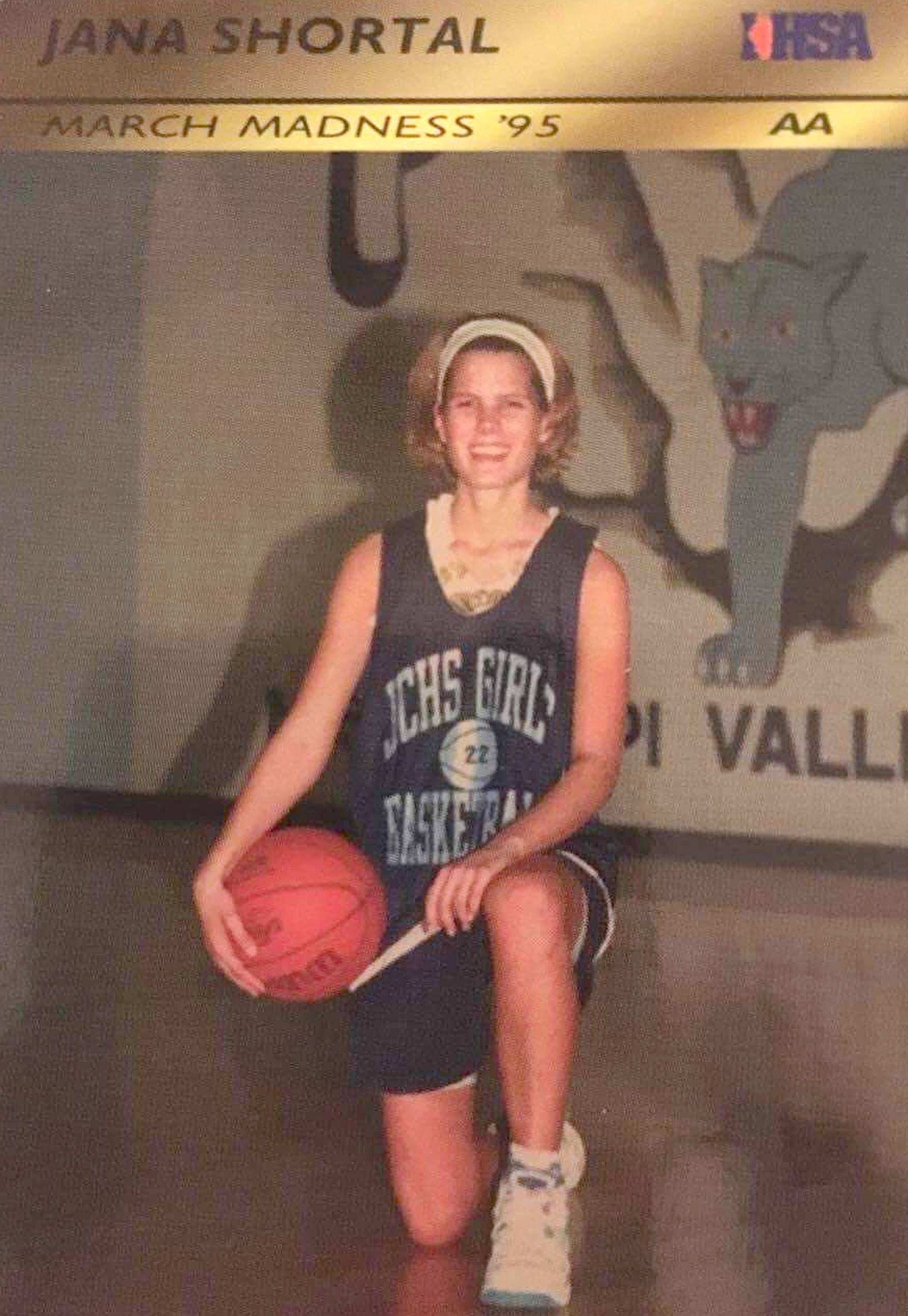 Jana Shortal in high school, in a basketball jersey.
